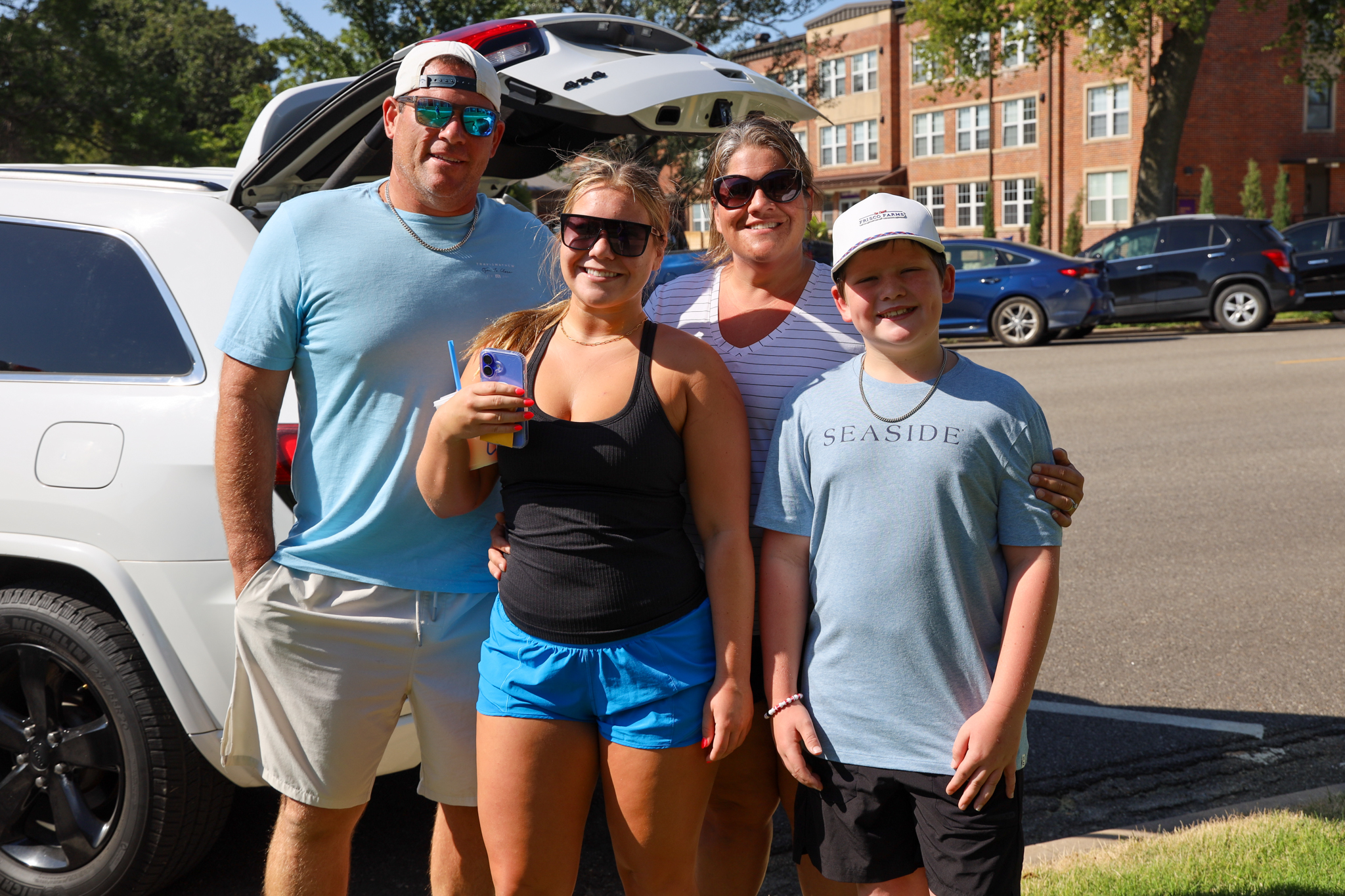 Family looking at camera smiling
