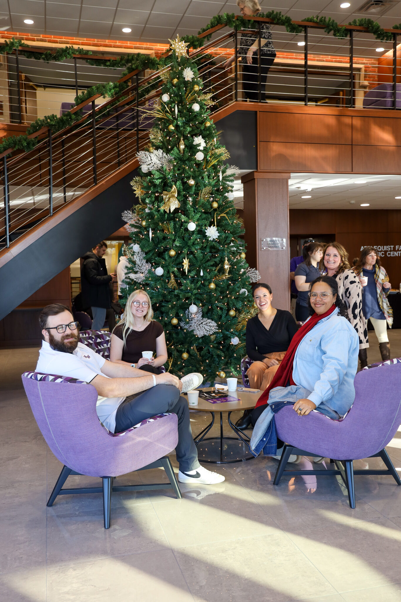 Group of people in chairs talking