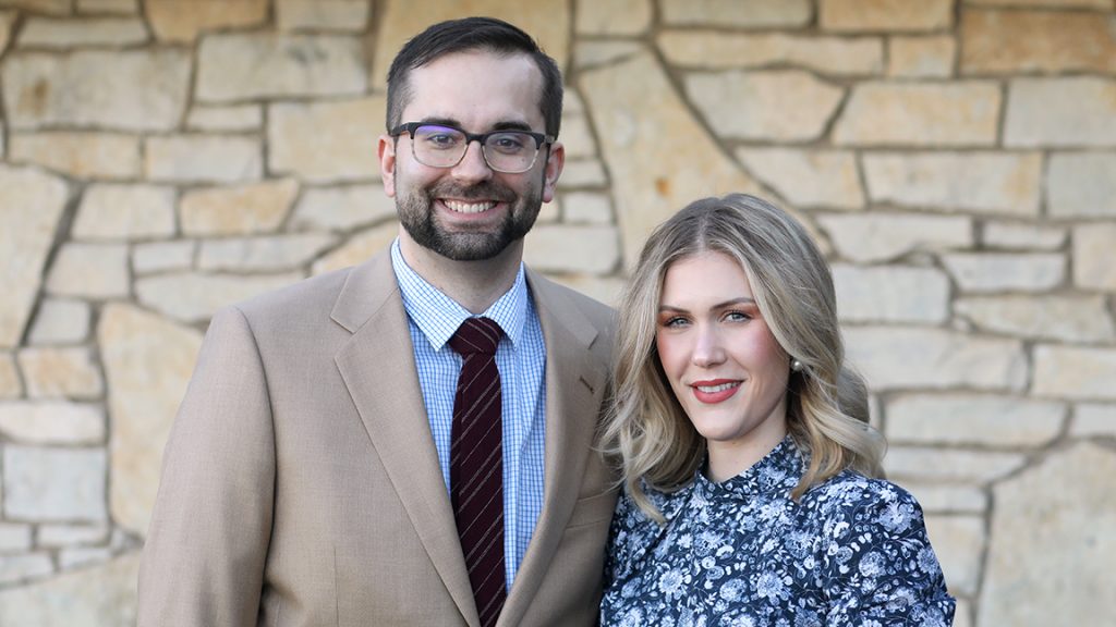 Man and woman standing together