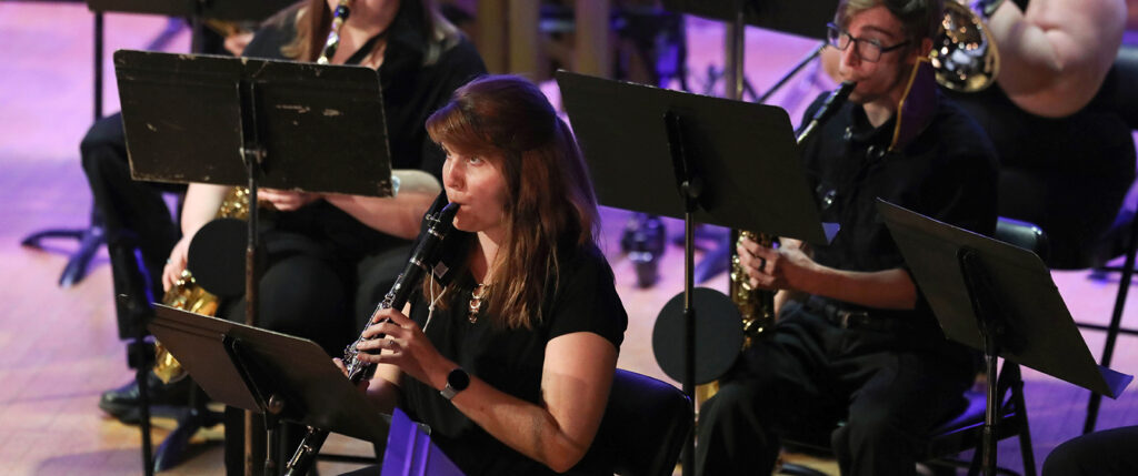 Student playing music in a concert