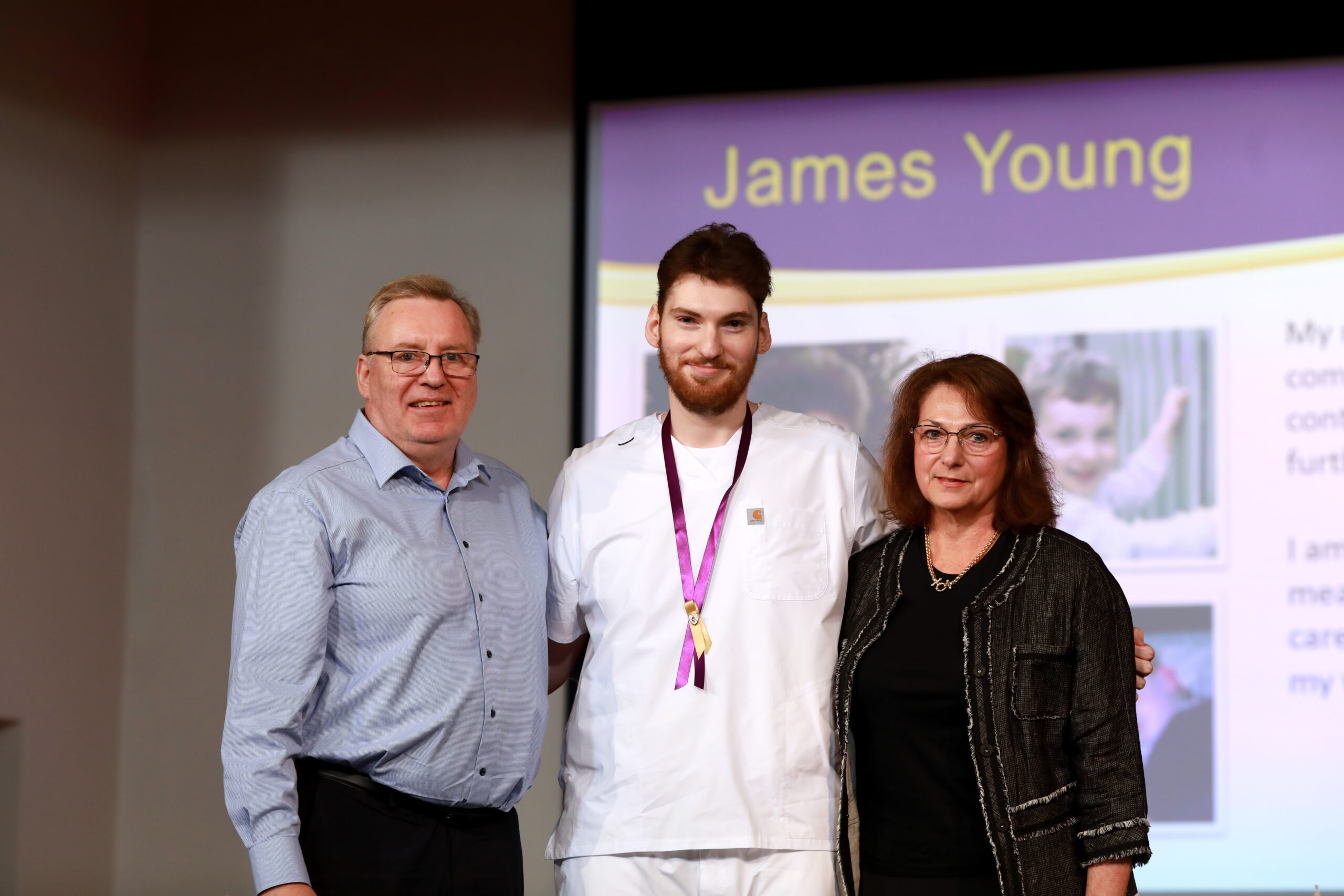 Nursing graduate with family