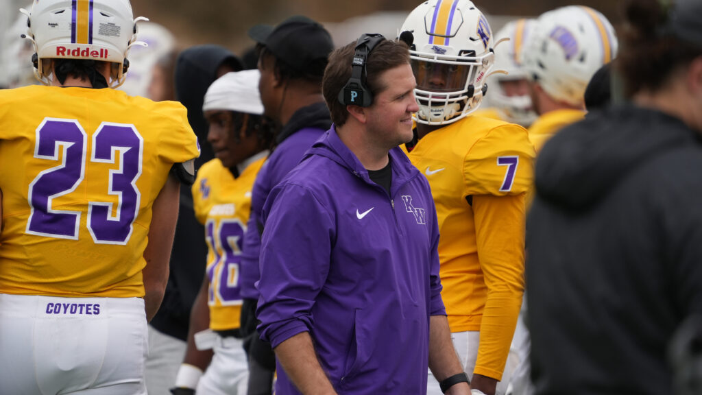 Football coach on sidelines