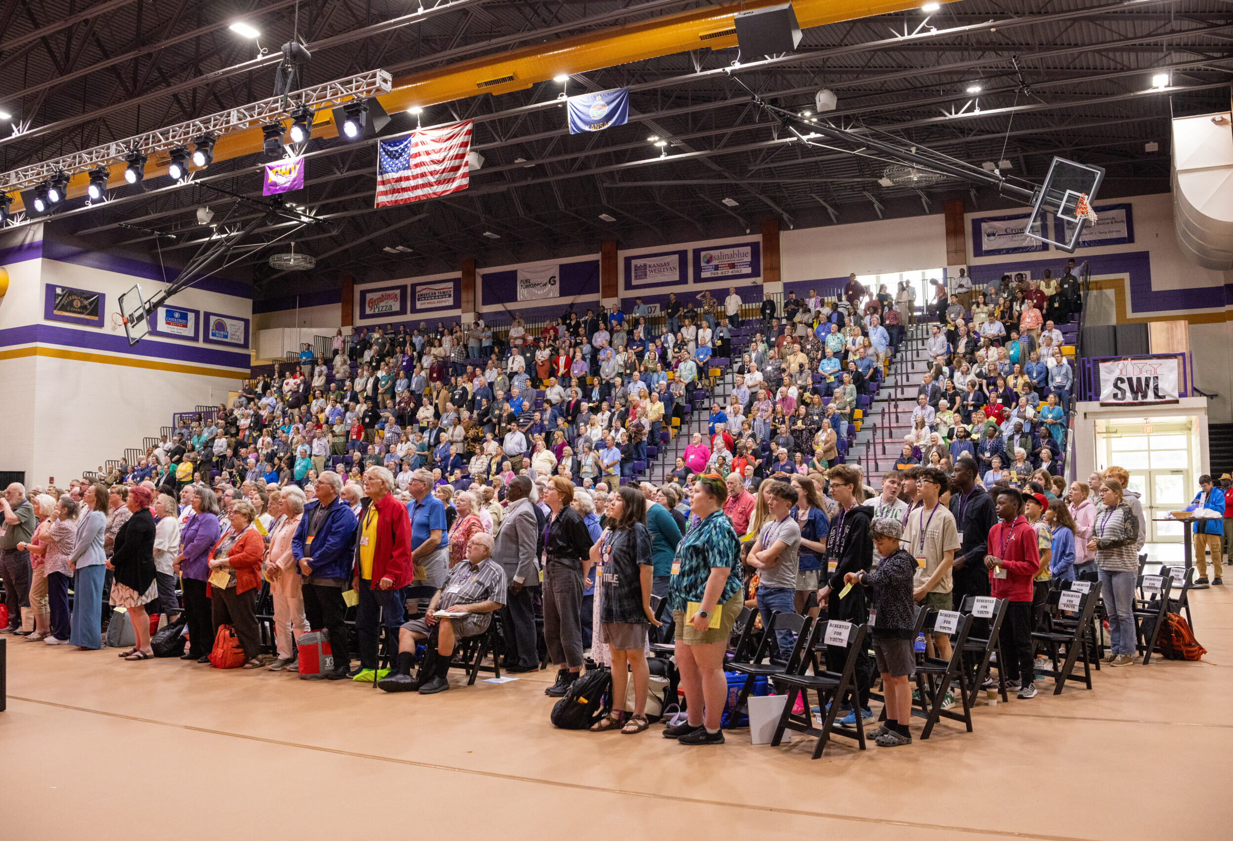 Wide angle shot of large audience in Mabee Arena