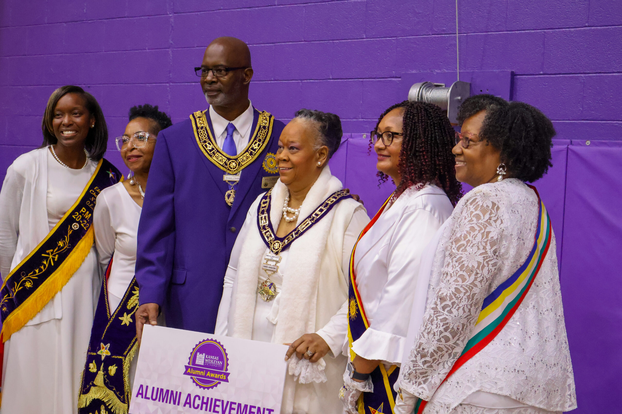 Group of individuals in Mason's attire