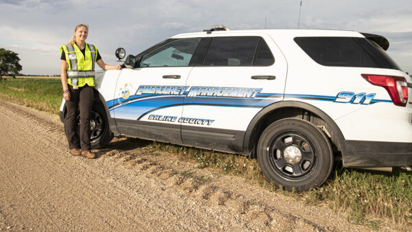 Alum in front of vehicle