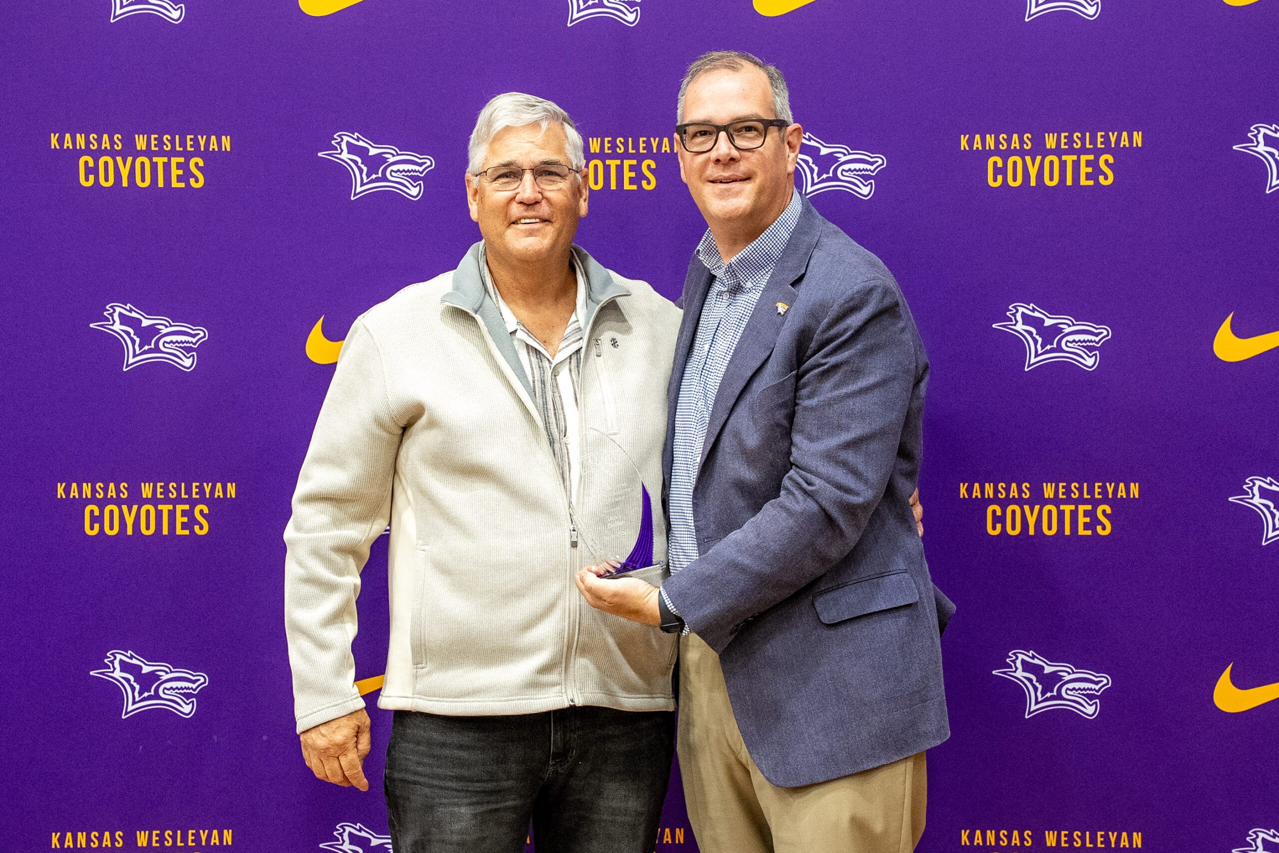 Man presenting award