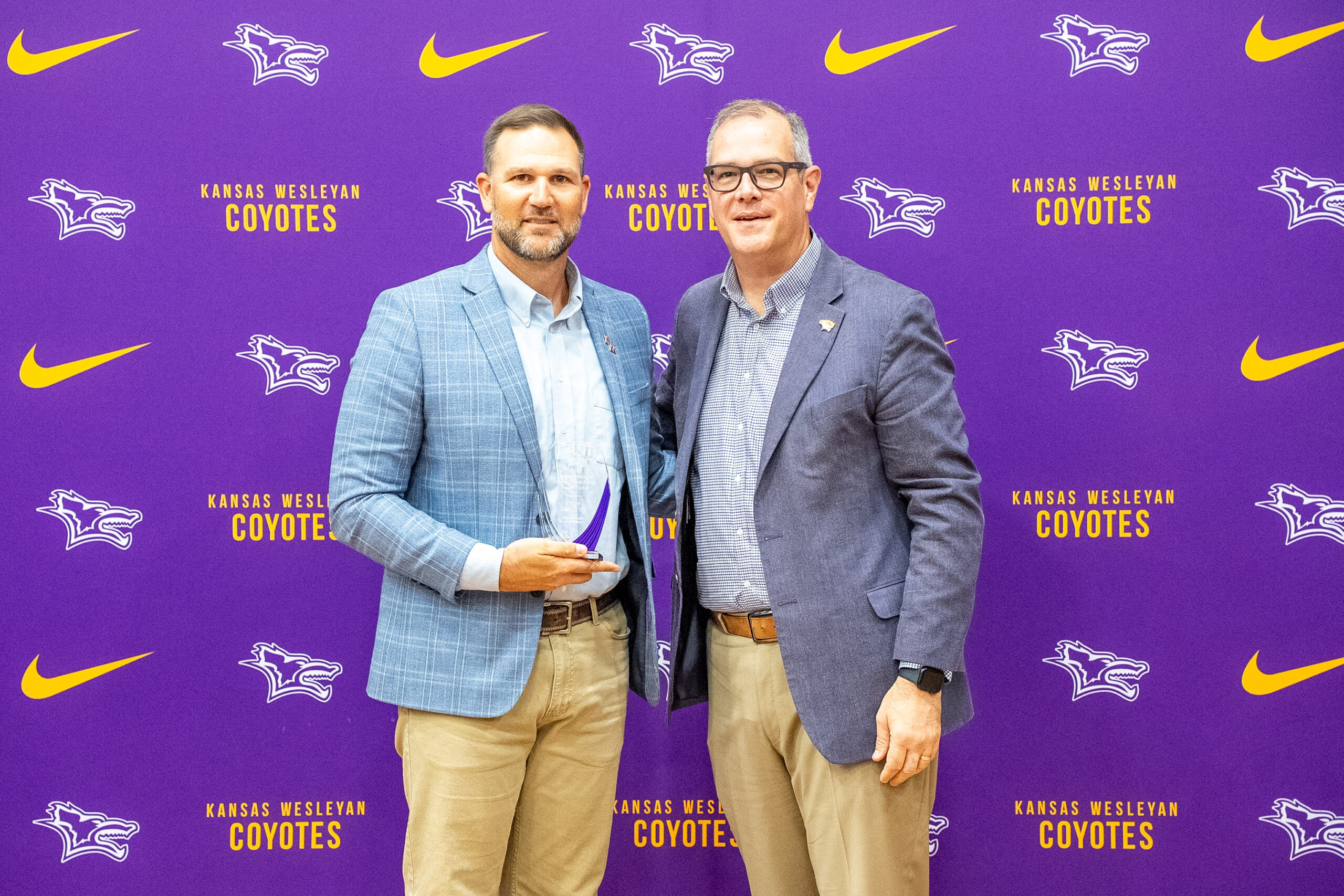 Man presenting award