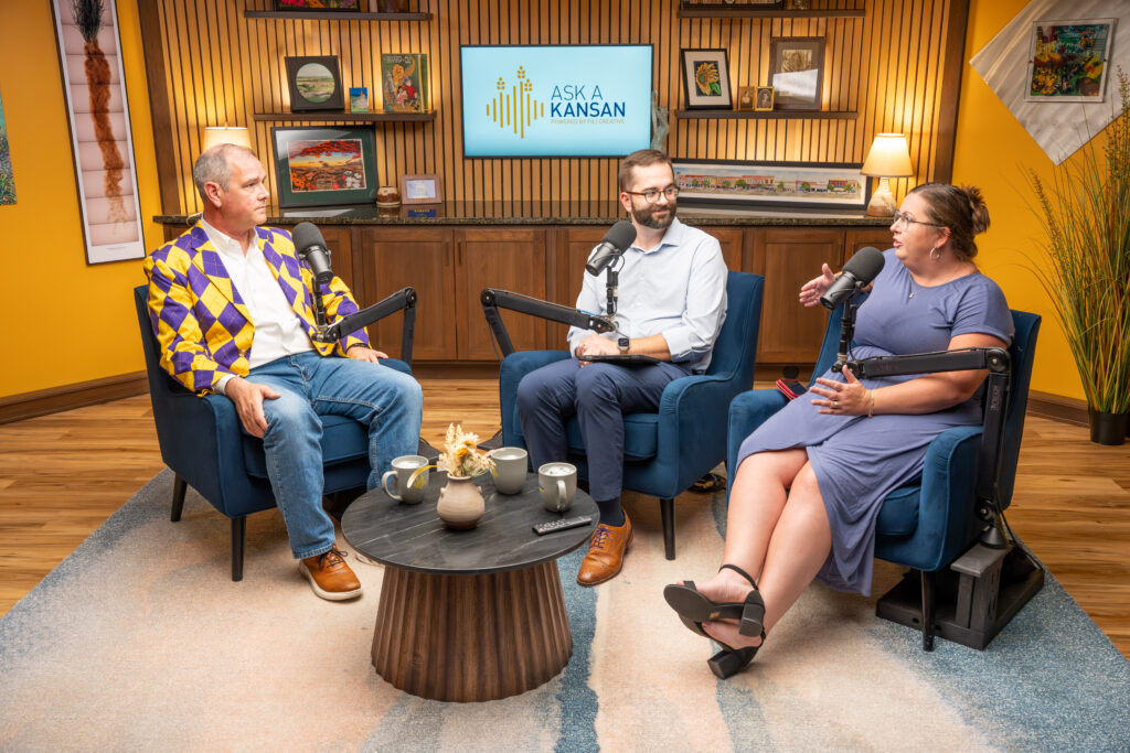 President Thompson with podcast hosts in studio