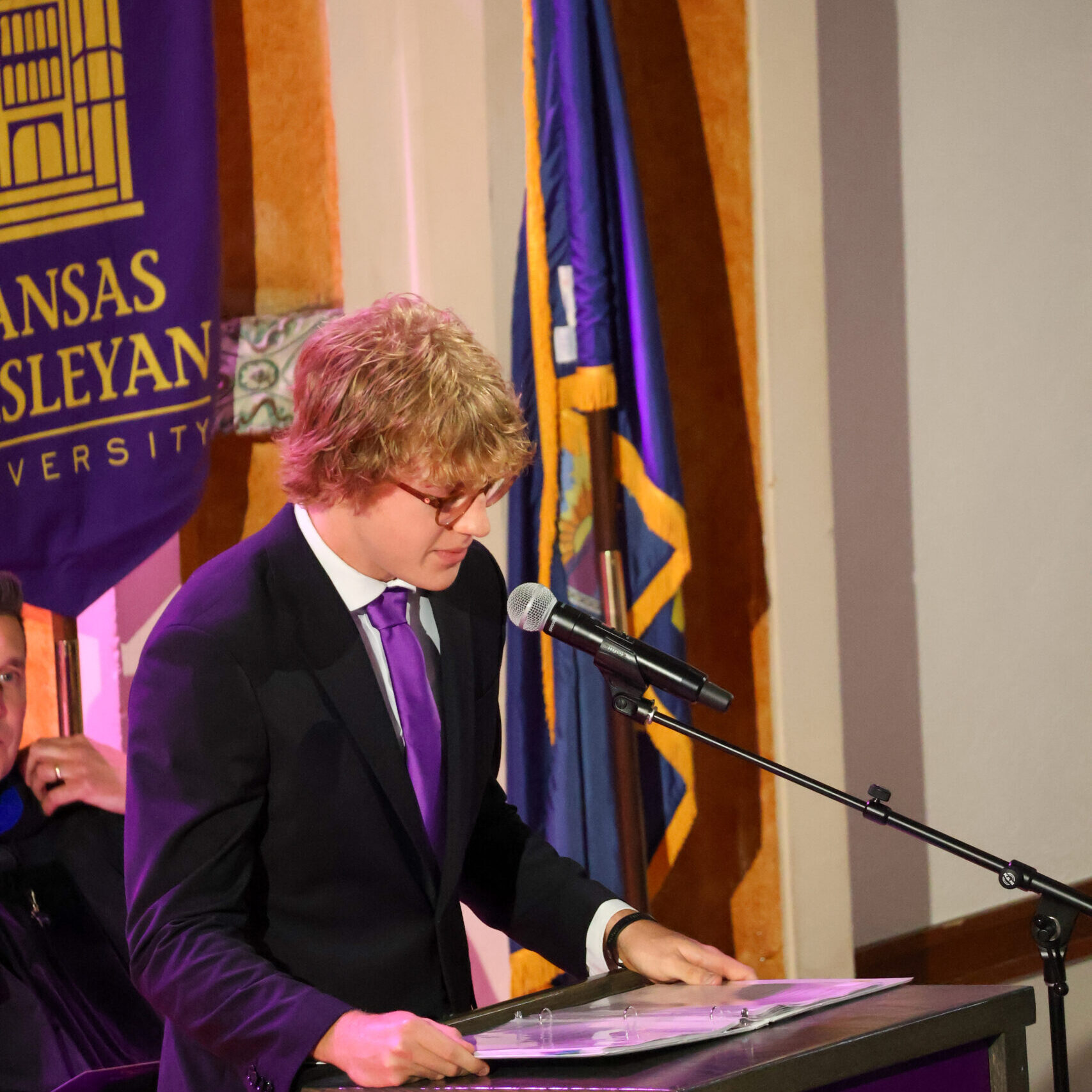 Man speaking at podium