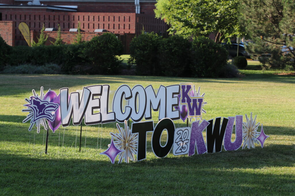 Welcome sign outside building