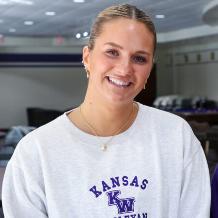 Single student on brown mezzanine