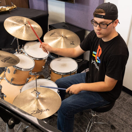 Student at drum set