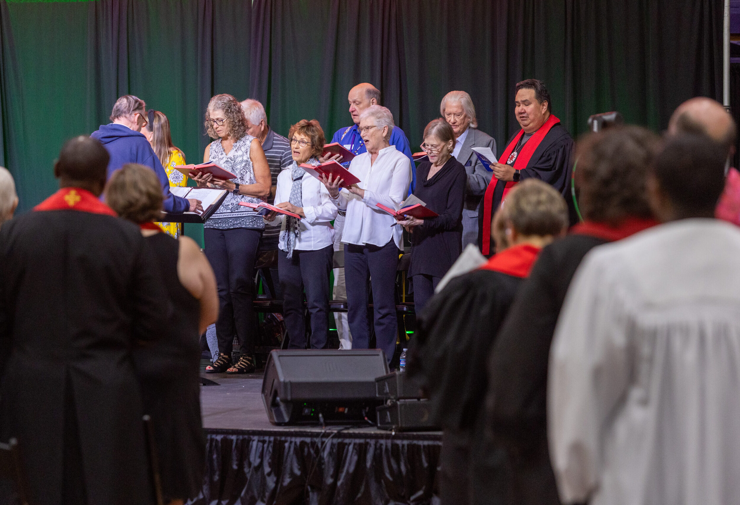 Group of people standing to sing during service