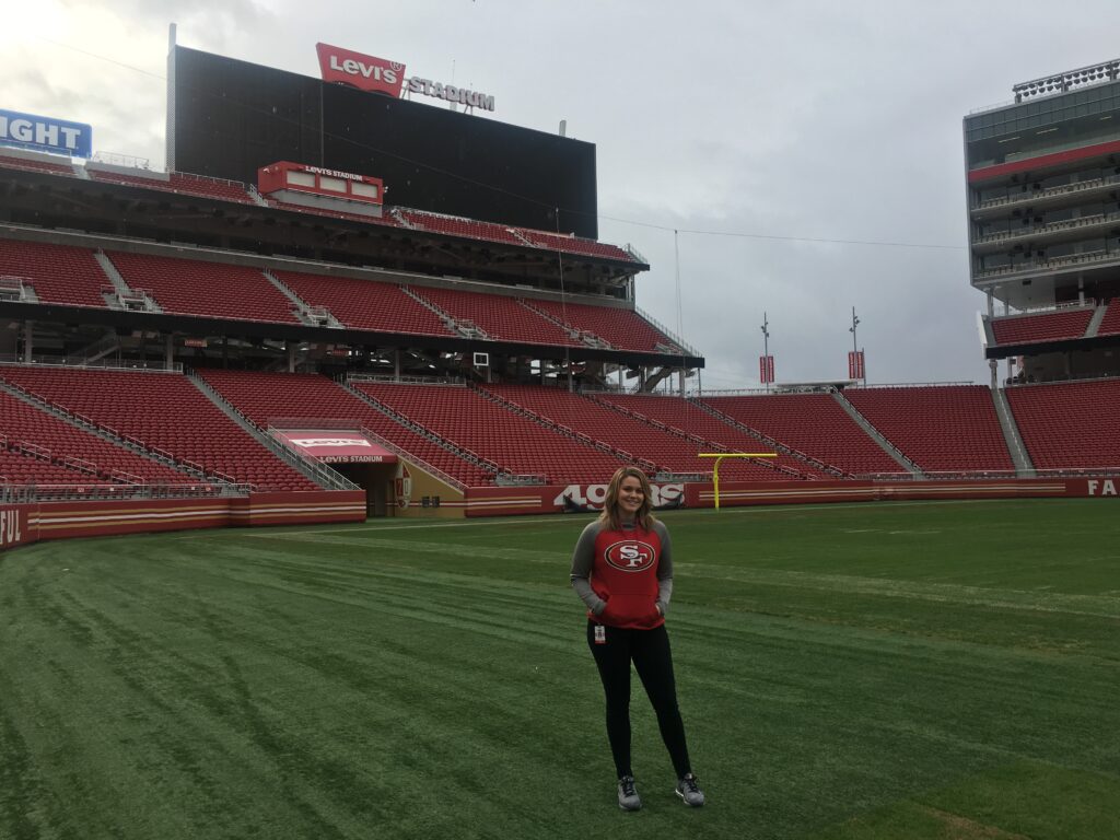 Woman on football field