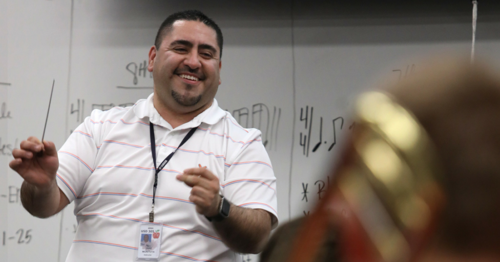 Man in front of class teaching